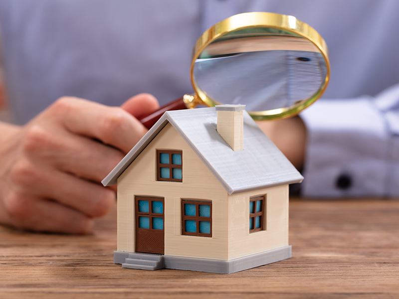 magnifying glass miniature house